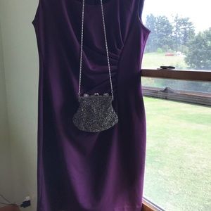 Size 12, worn twice, flattering fit